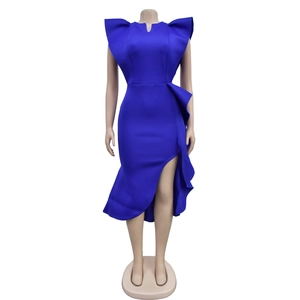 Close-up of royal blue ruffle dress detailing flutter sleeves and elegant V-neck design