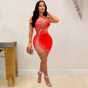 Detail of red mesh mini dress with silver rhinestones and sexy sheer cutouts