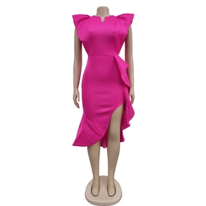 Detailed view of magenta v-neck dress with ruffle shoulders and asymmetrical hem
