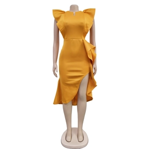 Detail of ruffled shoulders and V-neckline on a ginger yellow sleeveless dress