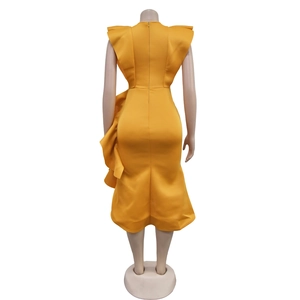 Detailed back view of a yellow ruffe sleeve dress with fishtail hem and hidden zipper
