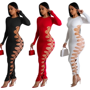Detail of the sexy side lace-up cutout on a long sleeve slim fit maxi dress