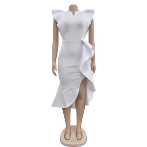 Detailed view of white slim fit dress with asymmetric ruffles and high slit design