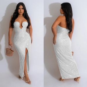 Detail of silver sequin evening dress featuring a deep V-neckline and high side slit design