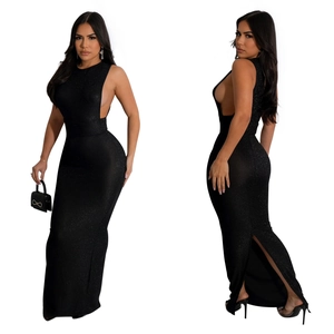 Close-up of black sequined evening dress featuring waist cut-outs and a high back slit