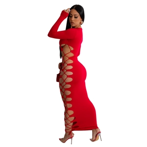 Detail of red long sleeve maxi dress with sexy side cut-out and lace-up design