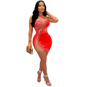Detail of red bodycon mini dress with rhinestone mesh cutouts and one-shoulder style