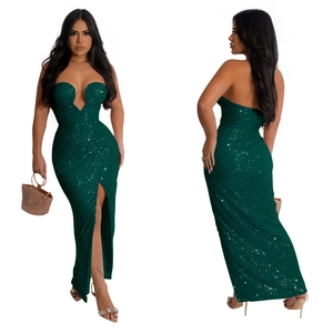 Detail of dark green sequin gown showing the sexy deep V-neckline and high slit design
