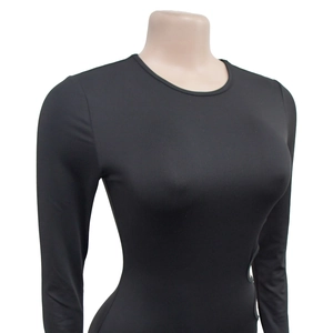 Close-up of slim fit black long sleeve bodysuit with crew neck on mannequin