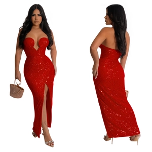 Detail of red sequin dress with deep V-neck, high slit, and shimmering fitted silhouette
