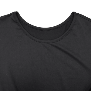 Detailed close-up of the round neckline and stitching on this black knitted dress