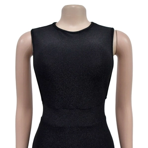 Close-up of black sleeveless dress showing the refined shimmer texture and neat tailoring