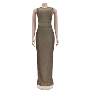 Detail shot of sleeveless long dress featuring metallic gold shimmer fabric and high slit