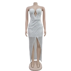 Detailed view of the white sequin evening dress with deep V-neck and front slit design