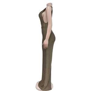 Detailed side view of a gold sequin sleeveless evening dress with a daring side cutout