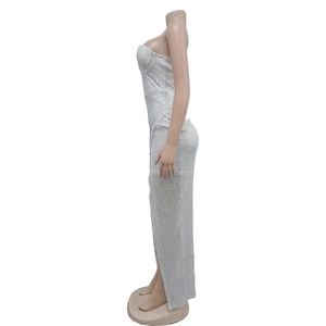 Detailed view of silver sequin evening dress featuring a slim fit and side slit design