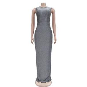 Detail of silver sleeveless maxi dress showing glitter texture and side slit design