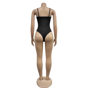Close-up of the back view of a black high-cut mesh jumpsuit with thin straps