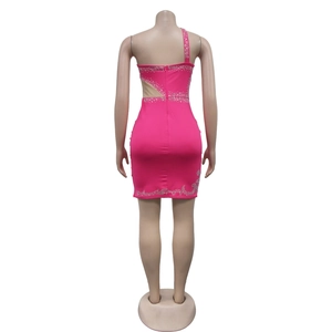 Detail of rose red one-shoulder mini dress with back cutout and sparkling rhinestone trim
