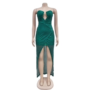 Detail of dark green sequin gown showing the sweetheart neckline and vertical shimmer texture