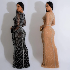 Detail of mesh long-sleeved dresses with wave rhinestone patterns in black and nude colors