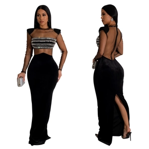 Elegant black mesh evening dress with silver rhinestones and open back design