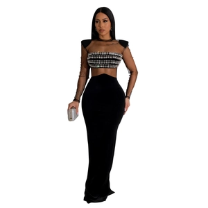 Elegant black evening gown with sheer mesh long sleeves and sparkling rhinestone details