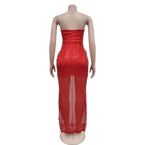 Detail of red sequin evening dress showing the back zipper and sheer mesh hemline