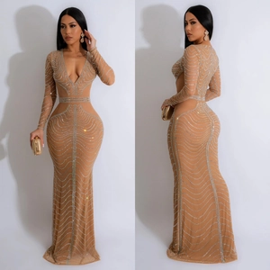 Elegant nude V-neck long sleeve mermaid dress with silver wavy rhinestones and side cutouts