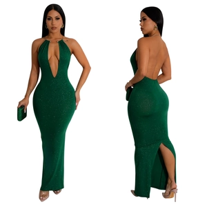 Front and back detail of a dark green sequined evening dress with backless halter design