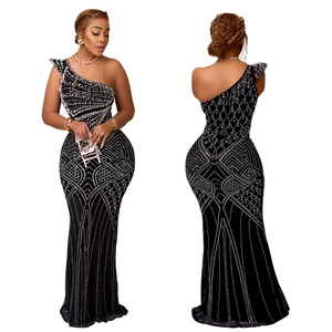 Women's black one-shoulder fishtail evening dress with silver rhinestone embellishments