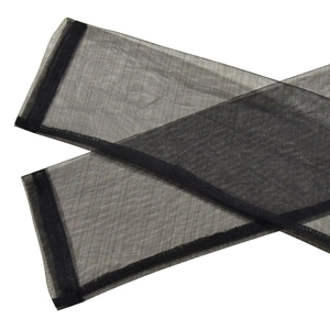 Detail shot of black mesh sheer sleeves with delicate texture and stitched edges