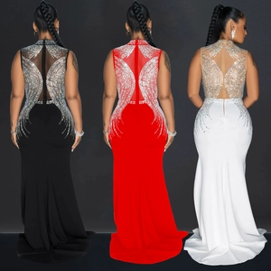 Detail view of mesh back design with rhinestone wing pattern on slim evening gown