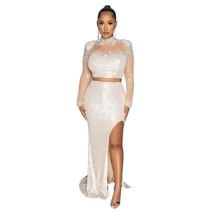 Exquisite close-up of sequined mesh long sleeve top and high-slit long skirt set