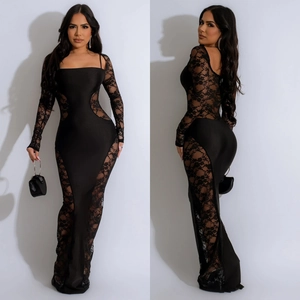Elegante abito lungo nero con maniche in pizzo e inserti floreali trasparenti ricamati