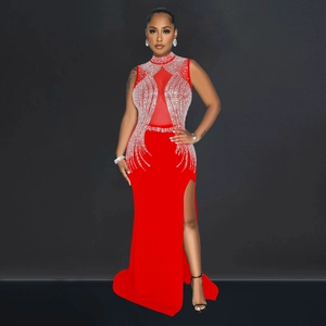 Detail of red sleeveless gown with silver rhinestones, sheer mesh and high side slit