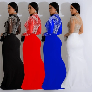 Detail view of mesh evening gowns with sparkling rhinestones in black red blue and white