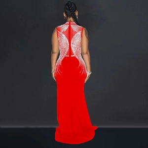 Detail of red mesh evening dress featuring sparkling silver rhinestone back patterns