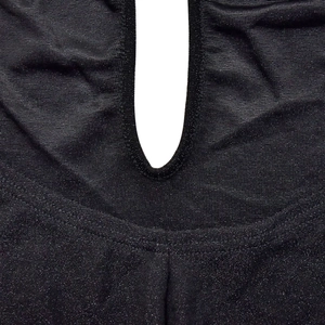 Detail of black shimmer fabric with keyhole cutout and elegant metallic fiber texture