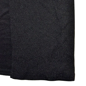 Detail of black glitter fabric with shimmering sequins and premium hemmed edge finish