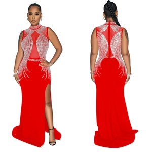 Detail of red slim fit evening dress featuring mesh patchwork and silver rhinestones