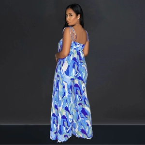 Detail of artistic print and elastic pleated back on summer wide-leg jumpsuit