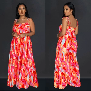 Women's vibrant abstract print pleated wide-leg jumpsuit with spaghetti straps for summer