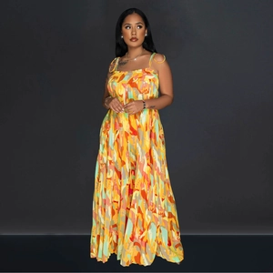 Detail of colorful geometric print pleated wide-leg jumpsuit for a vibrant summer look