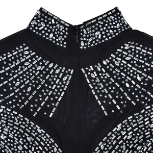 Detail of black mesh neckline with geometric rhinestones and hidden back zipper