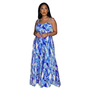 Detail of blue and white abstract print jumpsuit with pleated wide leg and thin straps
