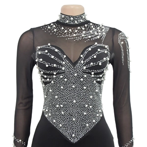 Detail of black bodysuit featuring elegant heart silhouette with pearls and rhinestones