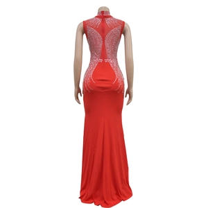 Close-up of sparkling silver rhinestones on the back of this red mermaid evening dress