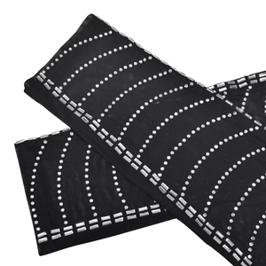 Detailed view of black mesh arm sleeves with silver rhinestones in elegant wavy patterns