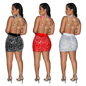 Ensemble deux pièces sexy pour femme avec haut à paillettes et jupe moulante